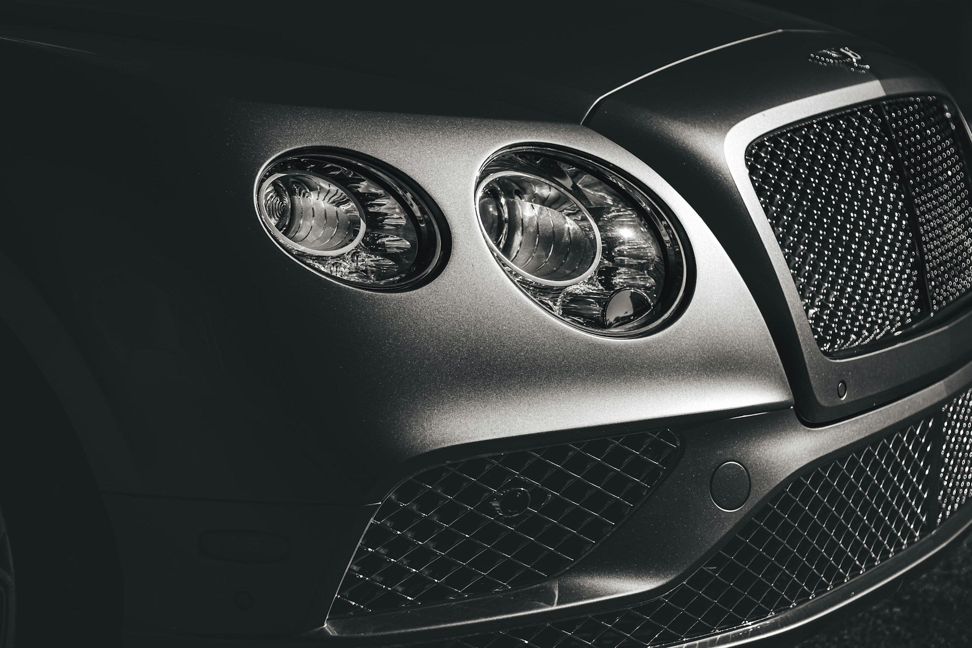 A close up of Bentley car front
