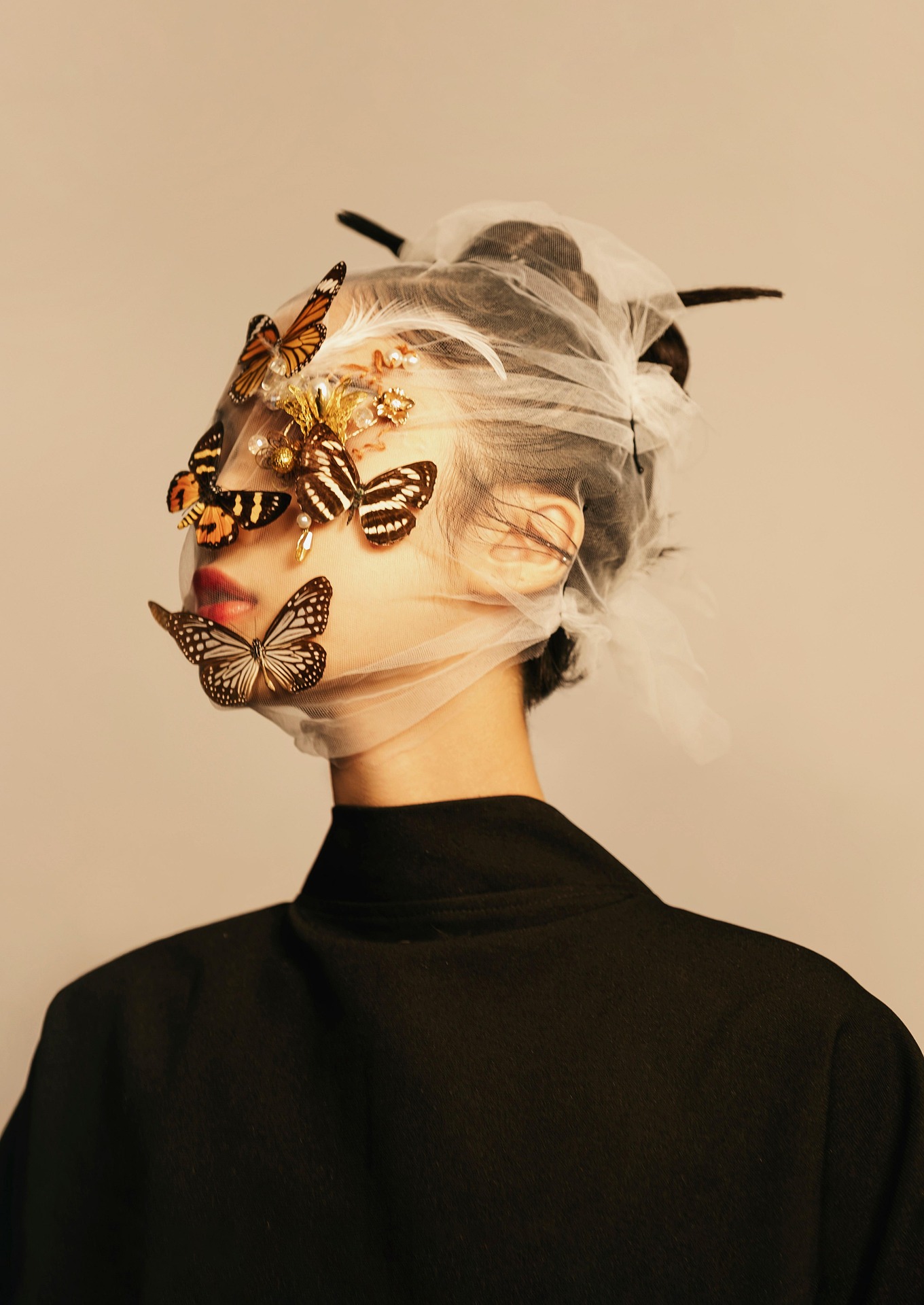 A woman with butterflies on face