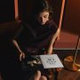 Woman reading Huawei MateBook