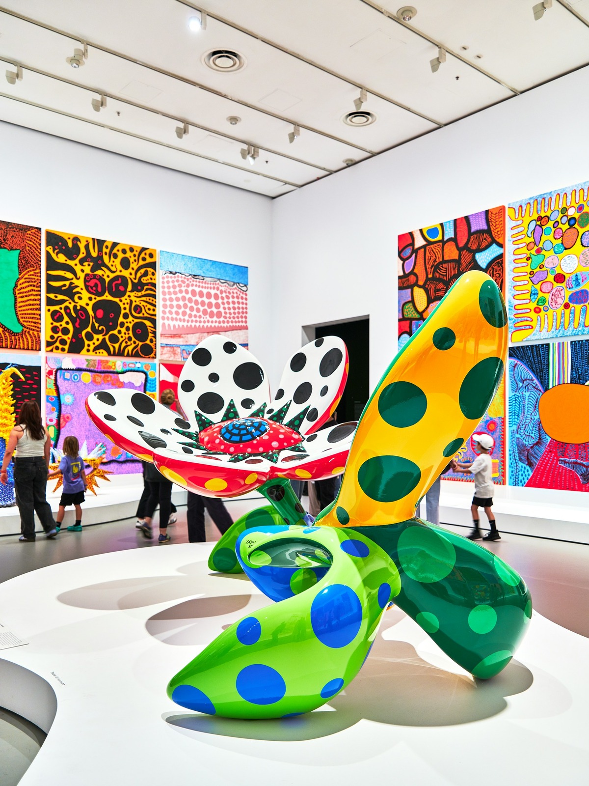 A group of people looking at art