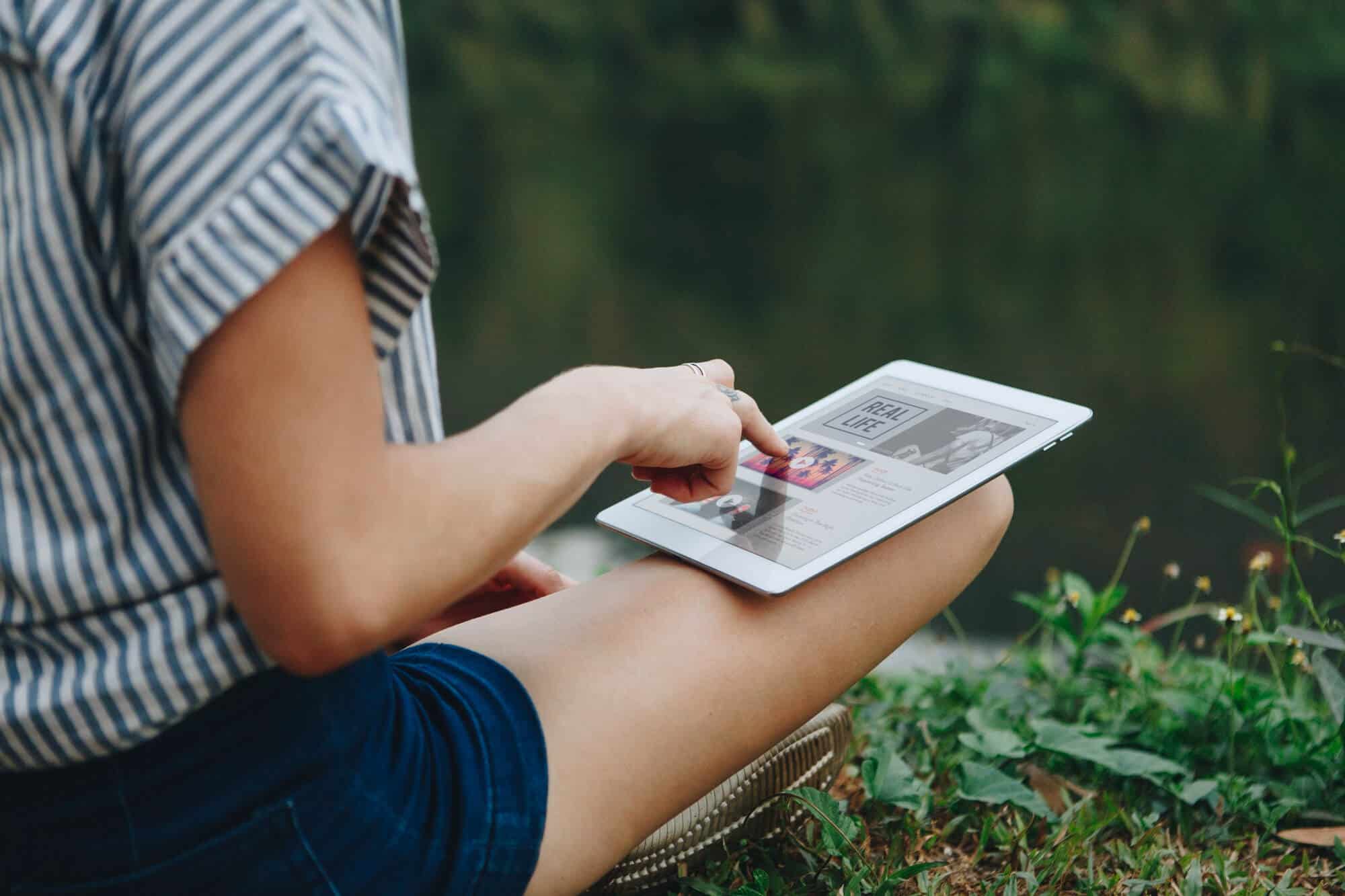 Woman using digital tablet