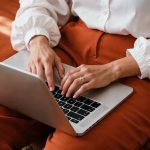 A women typing on the computer