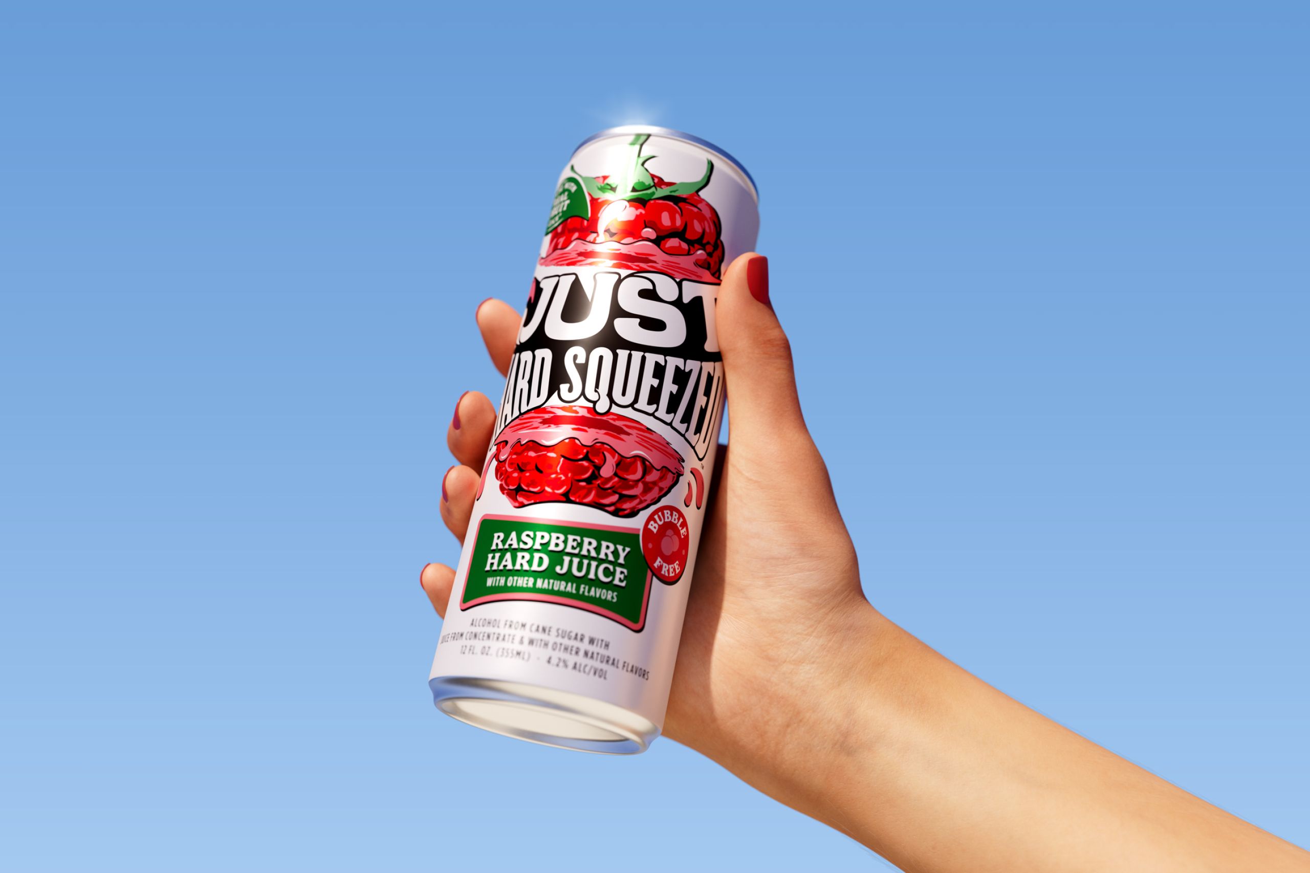A beverage can holding in hand