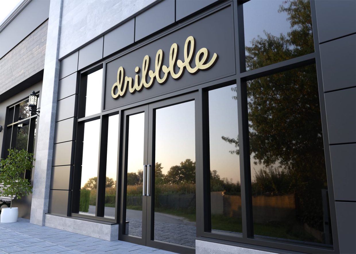A Dribbble logo on building
