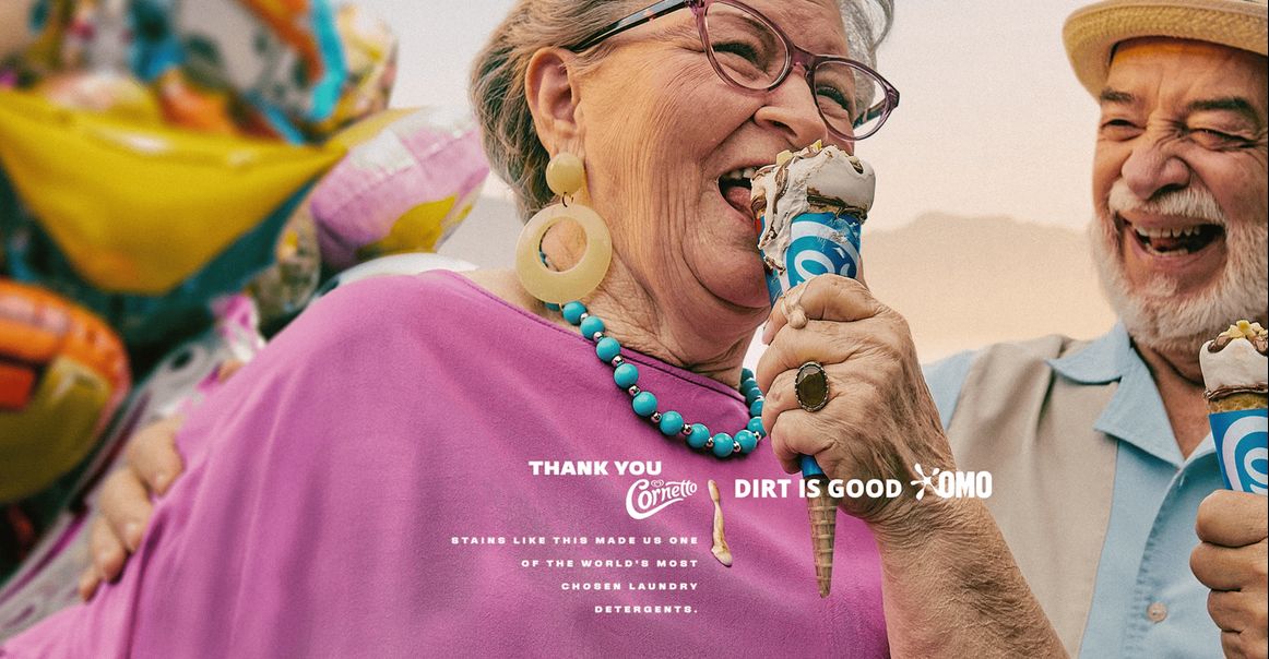 An oldie woman eating icecream
