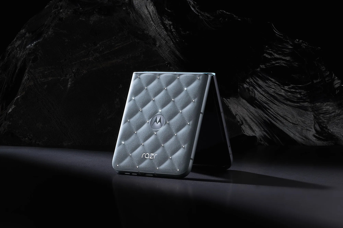 A Motorola Razr fip phone with crystals