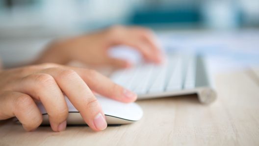 A person using keyboard and mouse