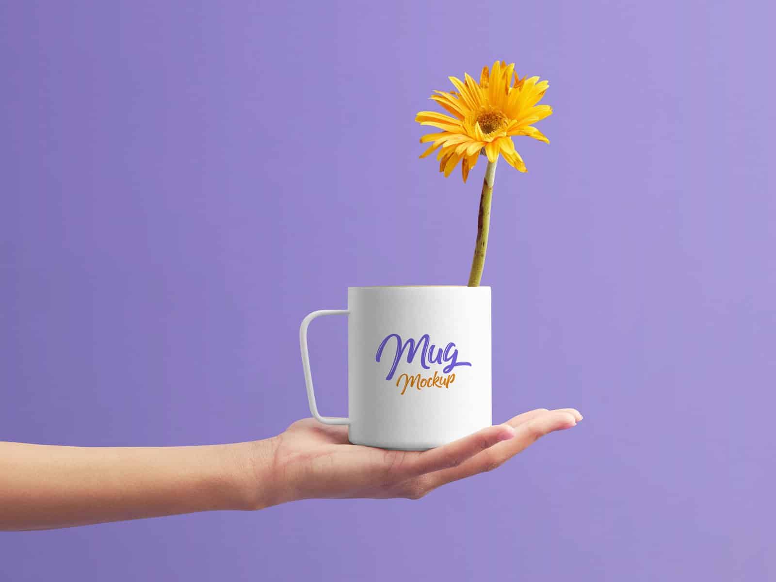 A free mug on hand mockup