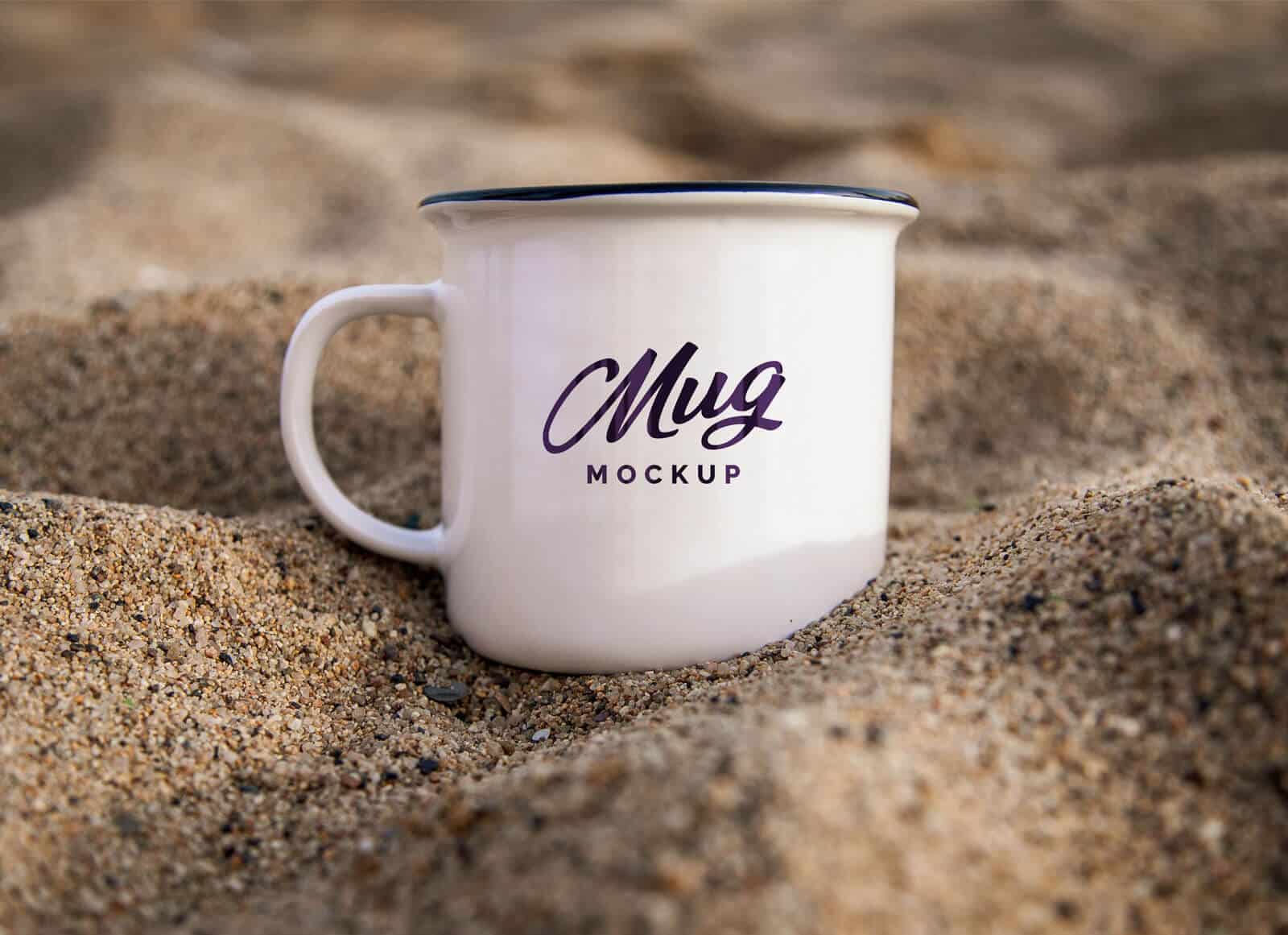A free enamel mug in sand mockup
