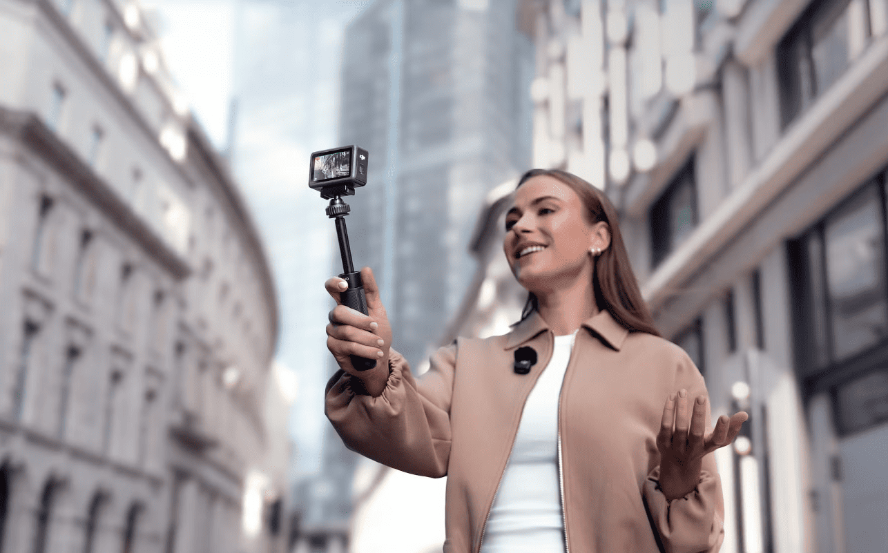 Girl taking video with DJI Osmo Action 6 camera