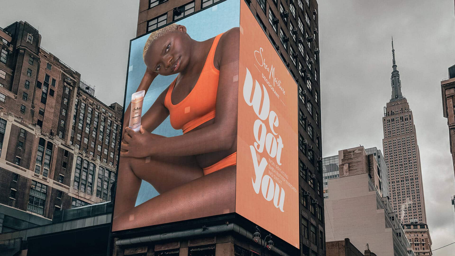 The billboard of SheaMoisture deodorant on the building