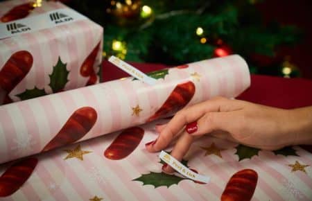 Aldo rolling out lickable wrapping paper cover