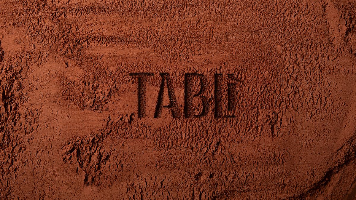 The Tabli logo on coffee