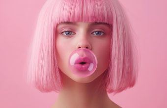 A girl with pink hair and bubble gum