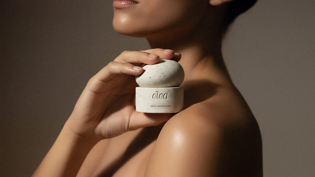 Women holding a jar of Elea skin care