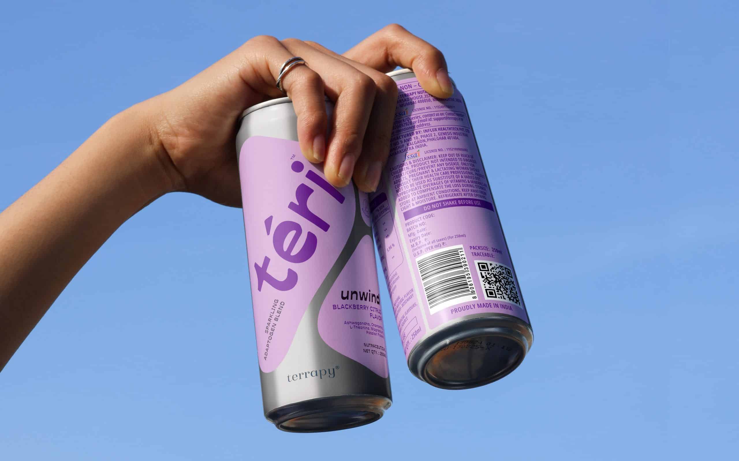 Welness drink cans in hands