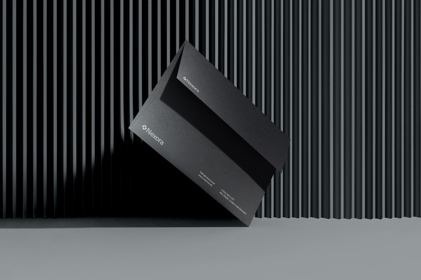 Nexora envelope branding